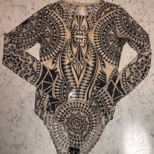 Sheer graphic long sleeve body suit